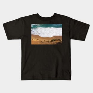 White water rolls in over orange sand at Port Campbell, Australia. Kids T-Shirt